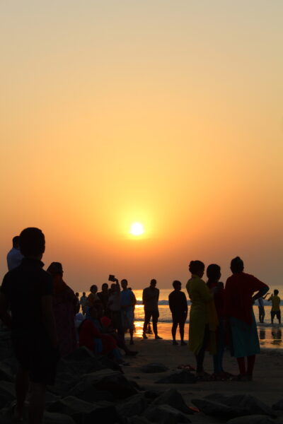 People on the Beach at Sunset